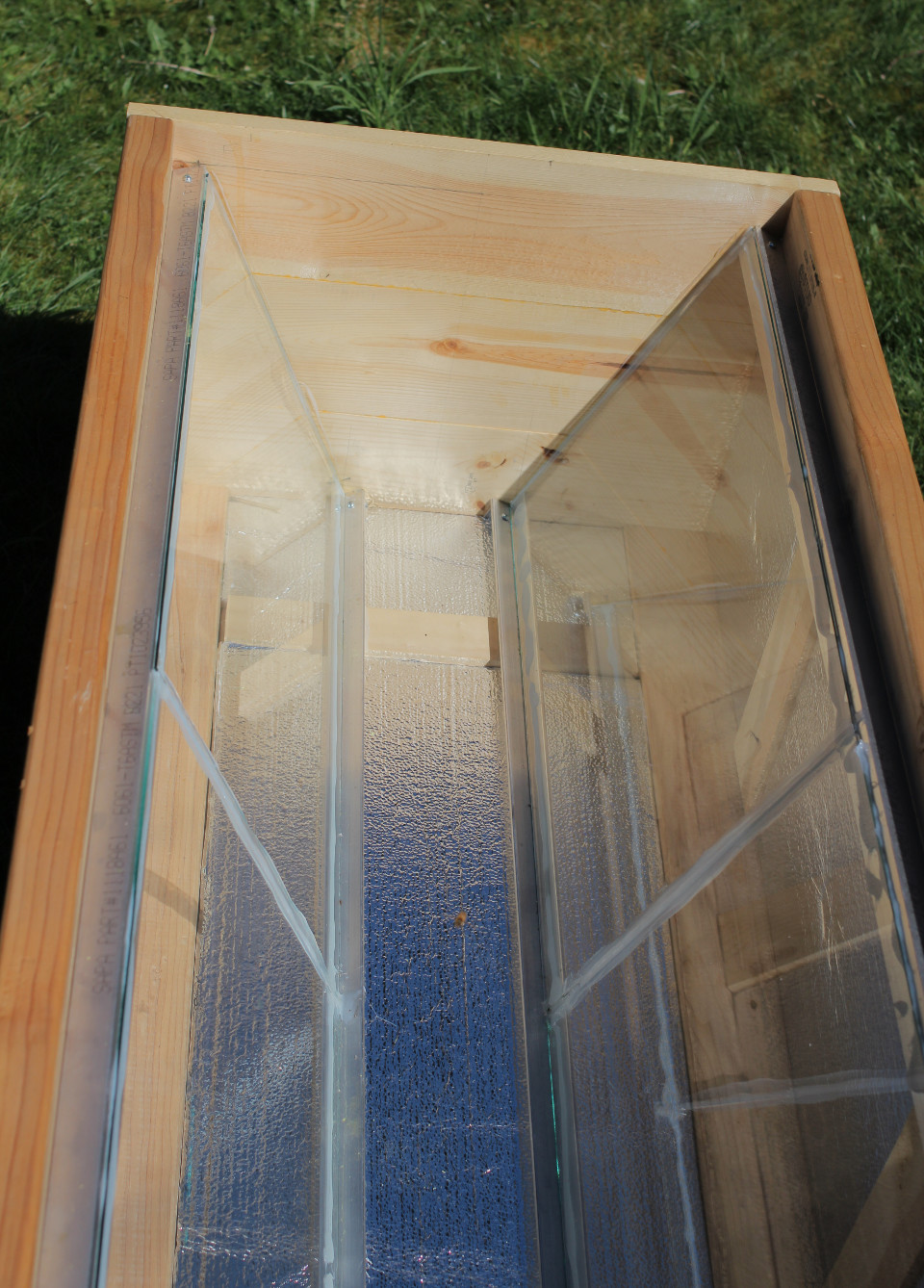 Fig.3 - The inner glass portion is similar in design to a traditional top bar hive.