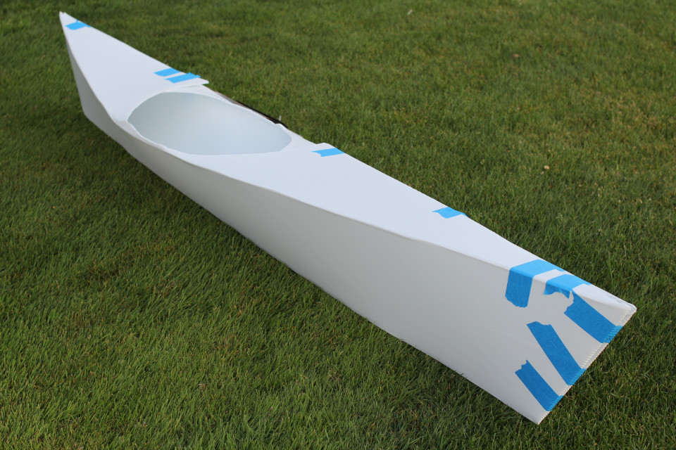 Fig.1 - A full view of the kayak. NOTE: The blue masking tape was for testing, and is not water proof. Rivets, snaps, staples, velcro straps or other attachments are recommended depending on whether you wish to unfold your kayak for portability.